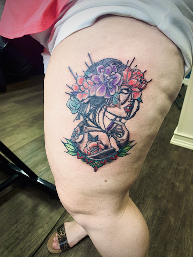 Explore aztec sleeve tattoo ideas, creative tattoo ideas in Lake City, available at Crooked Spines Tattoo Studio