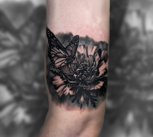 Explore dog tattoo ideas small, creative tattoo ideas in Milwaukee, available at Planet Artz Tattoo Studio