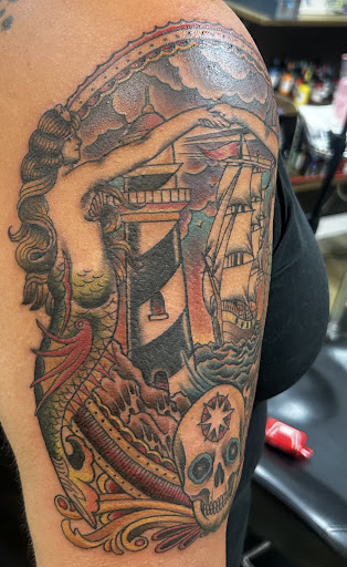 Explore mothman tattoo ideas, creative tattoo ideas in Hinesville, available at Liberty Tattoo Co