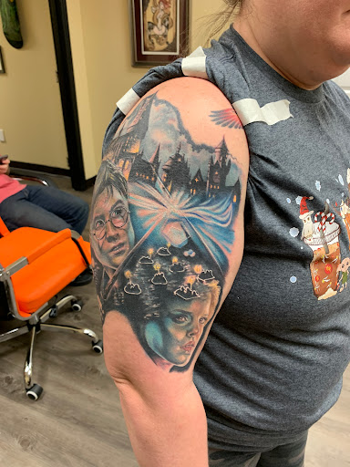 Explore jaws tattoo ideas, creative tattoo ideas in Greenville, available at The Gallery Tattoo Greenville