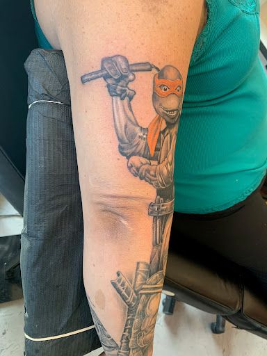 Explore neck tattoo ideas guys, creative tattoo ideas in Great Falls, available at Alpha Tattoos & Piercings