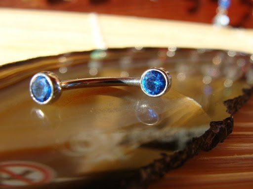 Explore red ink tattoo ideas for guys, creative tattoo ideas in Aurora, available at Ronin Tattoo Studio INC