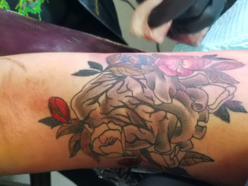 Tattoo Shop «Think Ink Tattoos», reviews and photos, 122 W Main St, Norman, OK 73069, USA