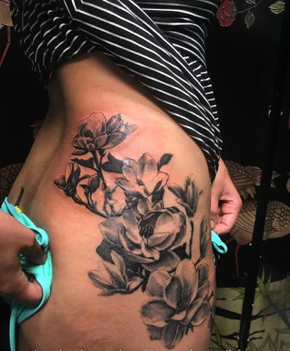 Explore male back tattoo ideas, creative tattoo ideas in Stevens Point, available at Black Rabbit Tattooing