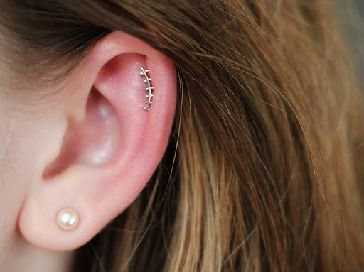 Explore faithful tattoo ideas, creative tattoo ideas in Toledo, available at Piercings by Caitlin presents Holier Toledo