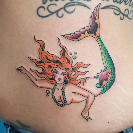 Explore jormungandr tattoo ideas, creative tattoo ideas in Miami, available at Tattoos by Lou Miami - Kendall