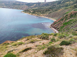 Plage Cap Rousseau'in fotoğrafı uçurumlarla desteklenmiş