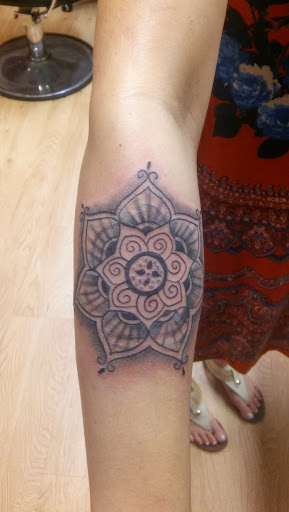 Explore upper sleeve tattoo ideas, creative tattoo ideas in La Crosse, available at La Crosse Tattoo