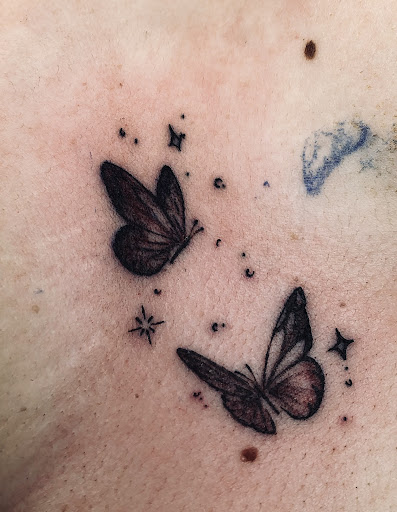 Explore rose tattoo ideas for men, creative tattoo ideas in North Tonawanda, available at Dark Side Ink Tattoo Studio