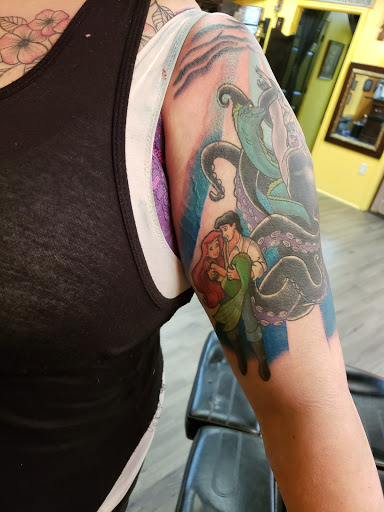 Explore hip thigh tattoo ideas, creative tattoo ideas in Oakwood, available at Underground Ink