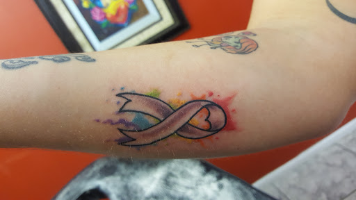 Explore cute monkey tattoo ideas, creative tattoo ideas in Winter Park, available at Beyond Ink Tattoo & Body Piercing