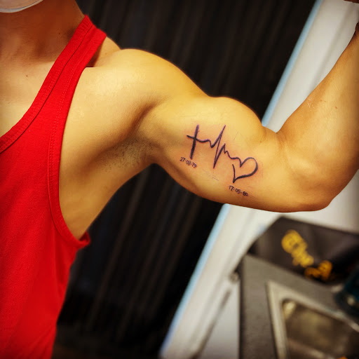 Explore fire force tattoo ideas, creative tattoo ideas in Belmont, available at The Body Art Gallery