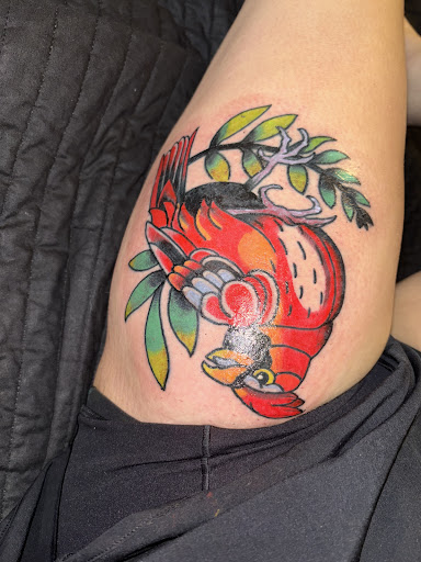 Explore 2 dog tattoo ideas, creative tattoo ideas in Bensalem, available at Electric Honor Tattoo Co.