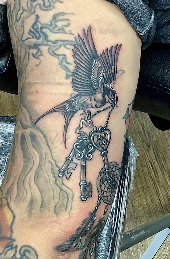 Find tattoo ideas for a mom for your next unique tattoo in Abilene at Sacred Art