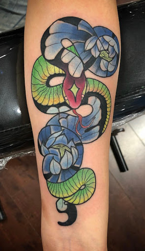 Explore hand name tattoo ideas, creative tattoo ideas in Modesto, available at Inkwell Tattoo