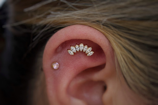 Explore breast cancer awareness tattoo ideas, creative tattoo ideas in Corona Del Mar, available at Rainbow Piercing & Jewelry