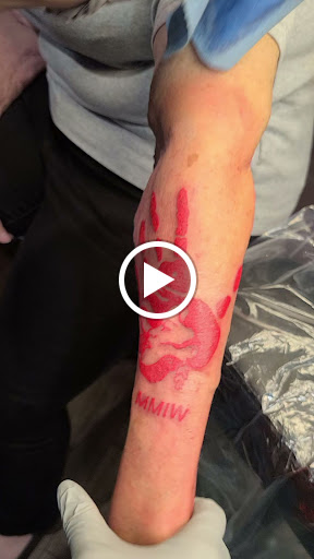 Explore back flower tattoo ideas, creative tattoo ideas in Clarksville, available at Dark Raine Tattoo