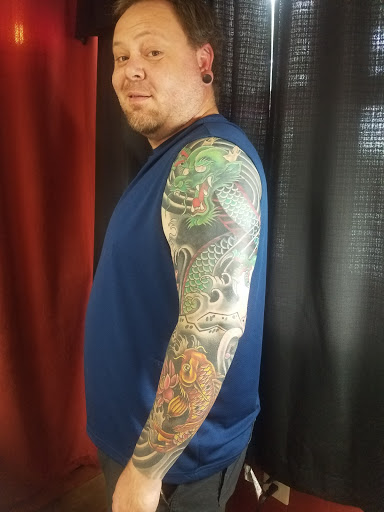 Find shark tattoo ideas for your next unique tattoo in Knoxville at American Tattoo Studio