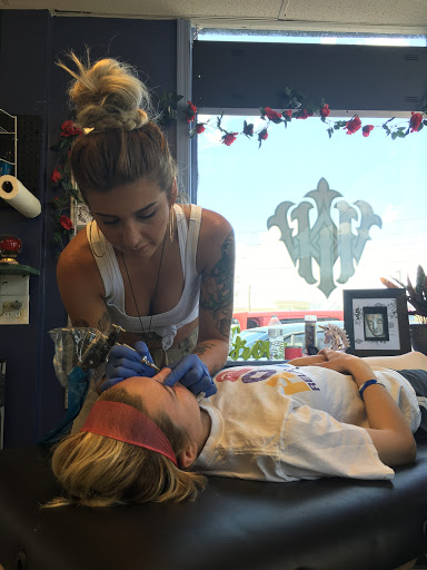 Explore tattoos behind ear ideas, creative tattoo ideas in Kent, available at War Horse Ink