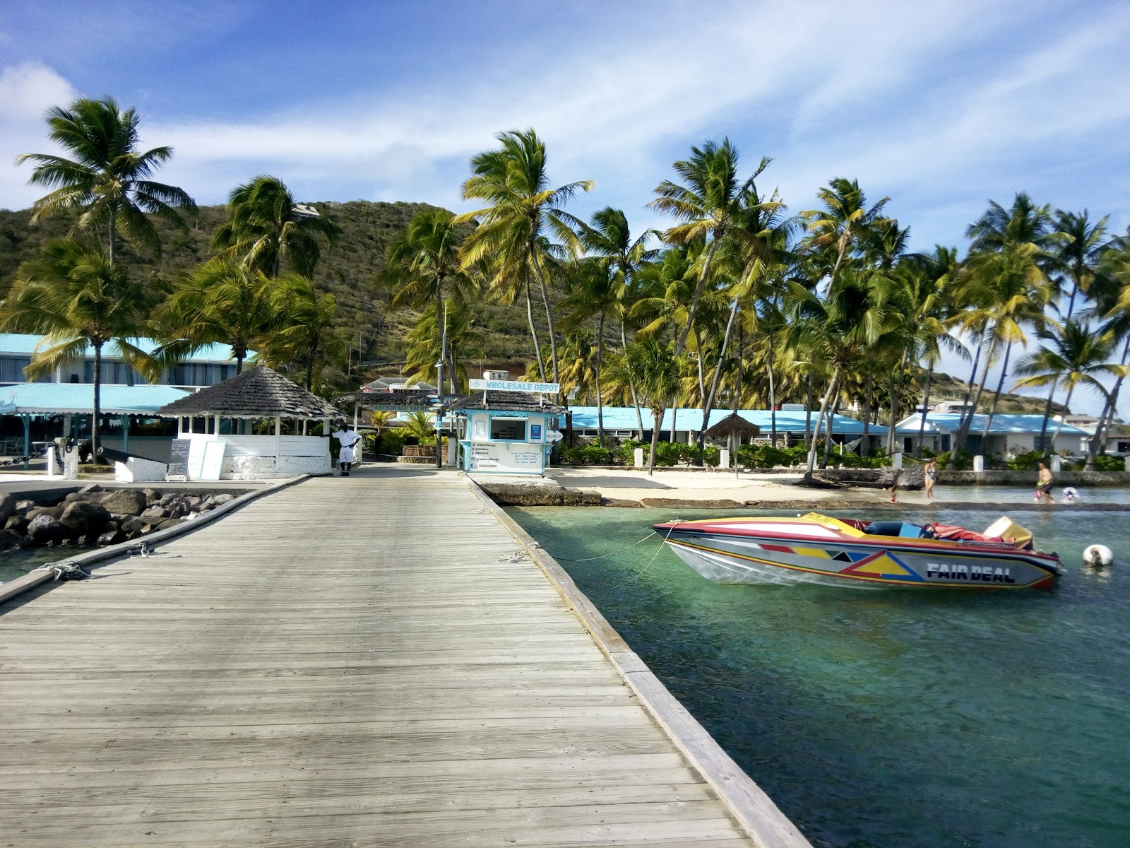Foto di Clifton Harbour beach sorretto da scogliere