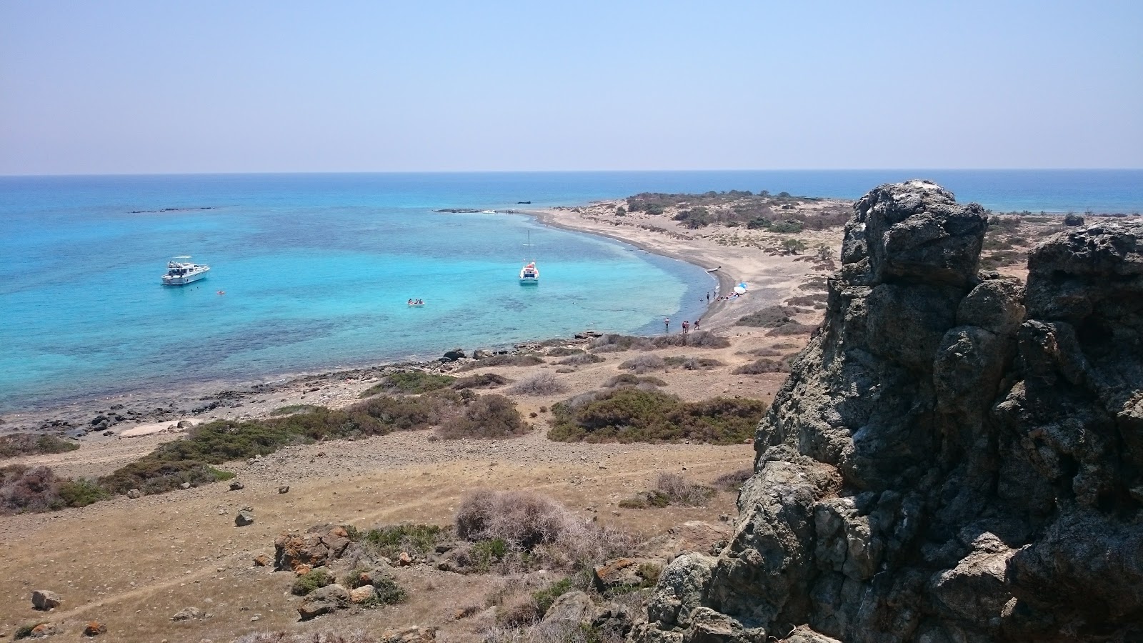 Photo of Kataprosopo with turquoise pure water surface