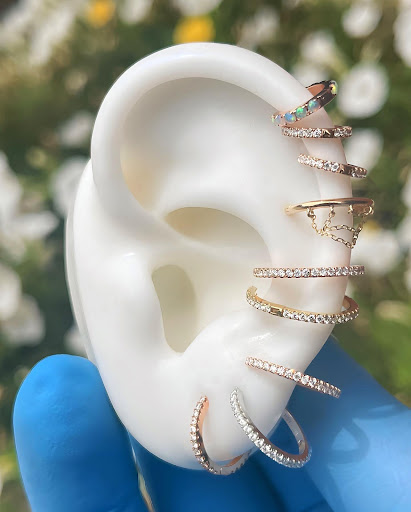 Explore shield tattoo ideas, creative tattoo ideas in Chicago, available at Identity Body Piercing