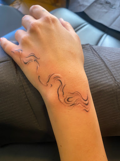 Explore cool hand tattoo ideas, creative tattoo ideas in Prescott, available at Bold as Love Tattoo and Piercing Studio