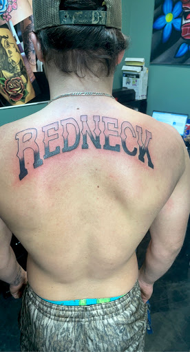 Explore woodstock tattoo ideas, creative tattoo ideas in Meridian, available at Creative Pain Tattoo Studio