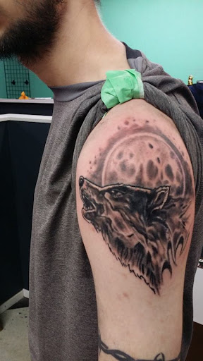 Explore tattoos behind ear ideas, creative tattoo ideas in Saint Albans, available at Red Dragon Tattoo