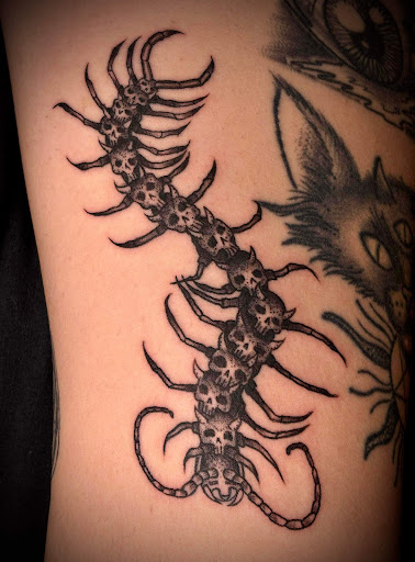 Explore barber tattoo ideas, creative tattoo ideas in Toledo, available at Meraki Tattoo