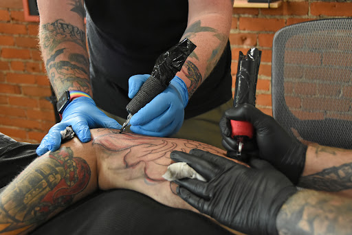 Explore guy leg tattoo ideas, creative tattoo ideas in Marshfield, available at Out of the Blue Tattoo