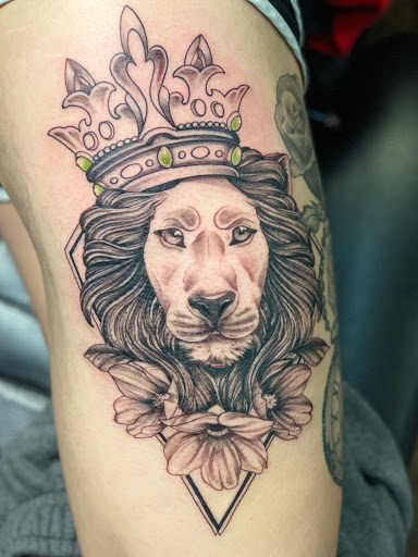 Find crown tattoo ideas for females for your next unique tattoo in Aberdeen at Branded Tattoo and Piercing