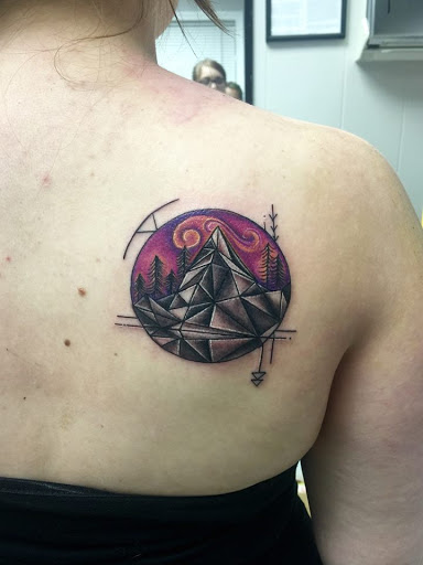 Explore rock climbing tattoo ideas, creative tattoo ideas in Myrtle Beach, available at Myrtle Beach Ink