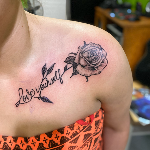 Find tattoo ideas between breast for your next unique tattoo in Evansville at Ink Therapy 101