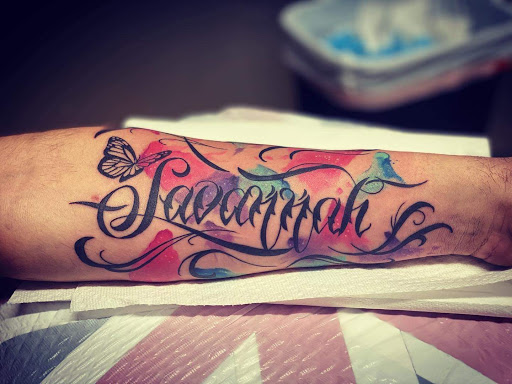 Explore wrestling tattoo ideas, creative tattoo ideas in Valdosta, available at Acid Ink Tattoos