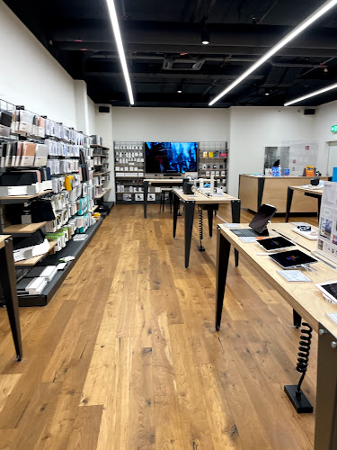 DQ Solutions Mall of Switzerland | Apple Authorised Reseller - Computergeschäft