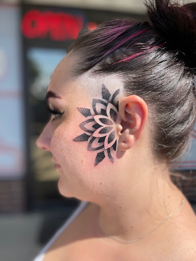 Explore elegant spine tattoo ideas, creative tattoo ideas in Savannah, available at White Bluff Tattoo Company