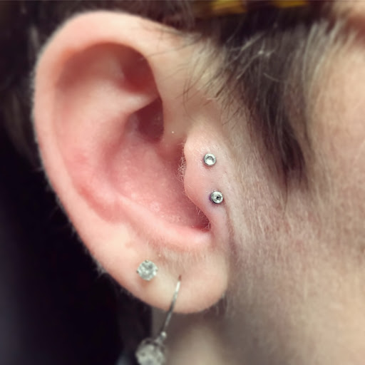 Explore name tattoo placement ideas, creative tattoo ideas in Oswego, available at Bodified