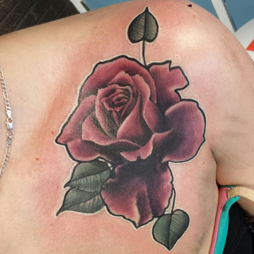 Explore alpha tattoo ideas, creative tattoo ideas in Chicago, available at Royal Flesh Tattoo and Piercing