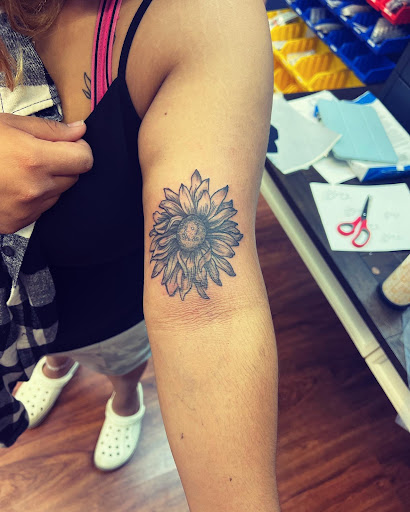 Explore tattoo ideas floral, creative tattoo ideas in Cocoa, available at Rorschach Tattoo Shop and Piercing Studio