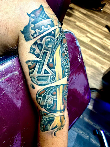 Find women's rib tattoo ideas for your next unique tattoo in Warner Robins at Untold Pain Tattoo Studio