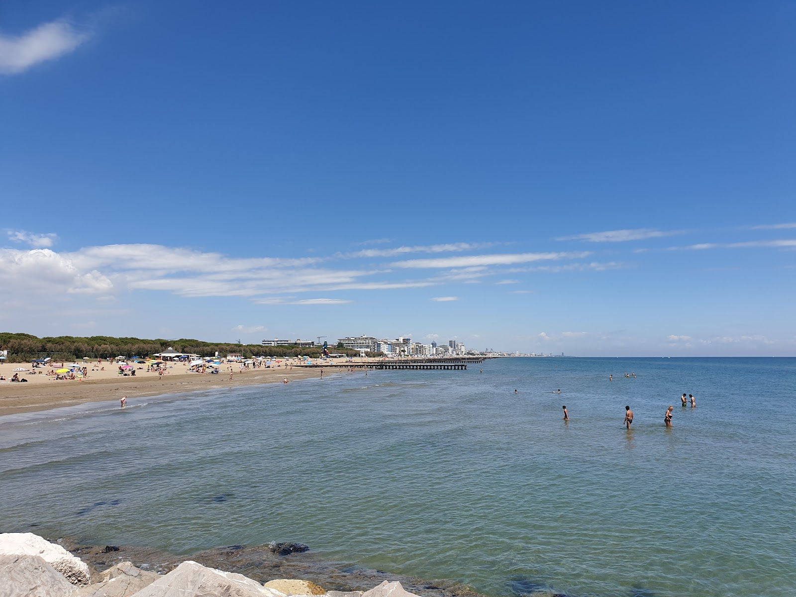 Foto av Spiaggia del Faro med rymlig strand