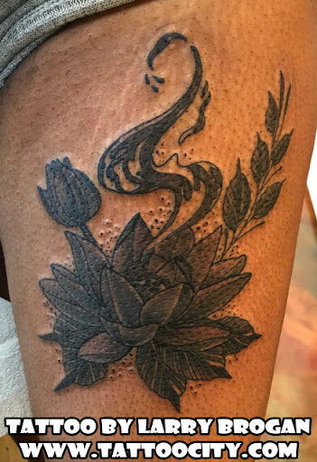 Explore 3 percent tattoo ideas, creative tattoo ideas in Lockport, available at Tattoo City by Larry Brogan