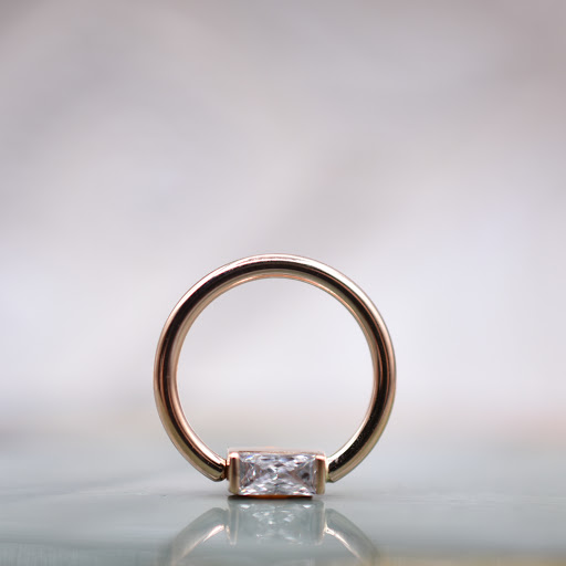 Explore broken tattoo ideas, creative tattoo ideas in Reno, available at Black Hole Body Piercing