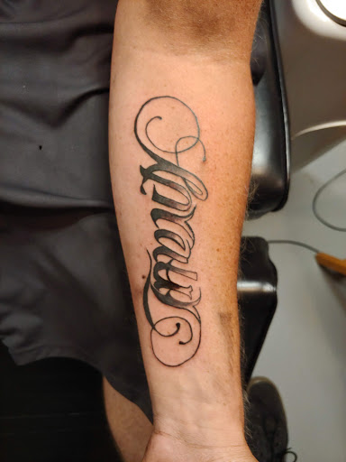 Explore cervical cancer tattoo ideas, creative tattoo ideas in Williamston, available at Inkd Tattoo Parlor