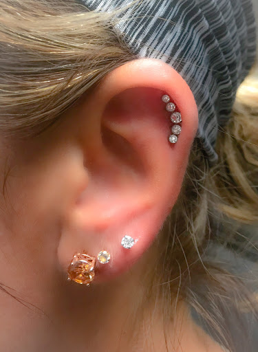 Explore enlightenment tattoo ideas, creative tattoo ideas in Springfield, available at Body Piercing By Qui Qui