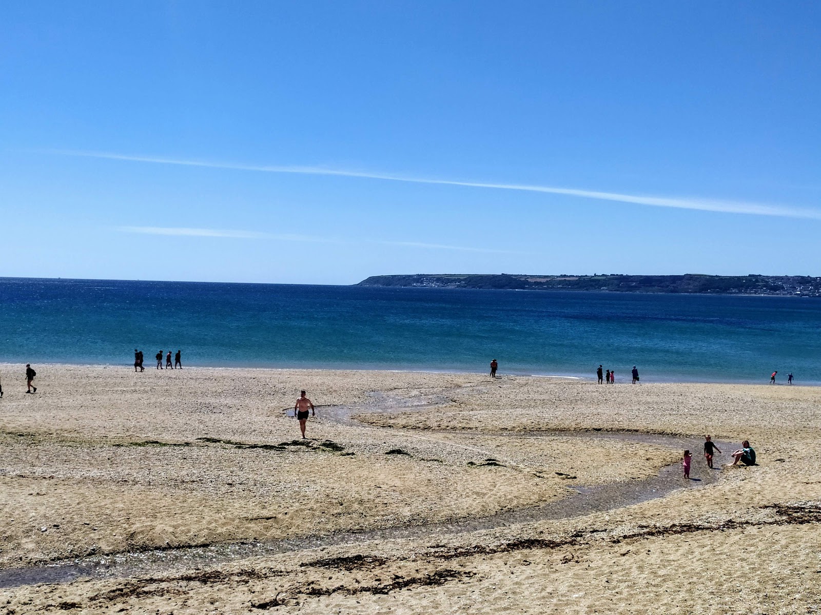 Foto van Marazion Marsh strand met recht en lang