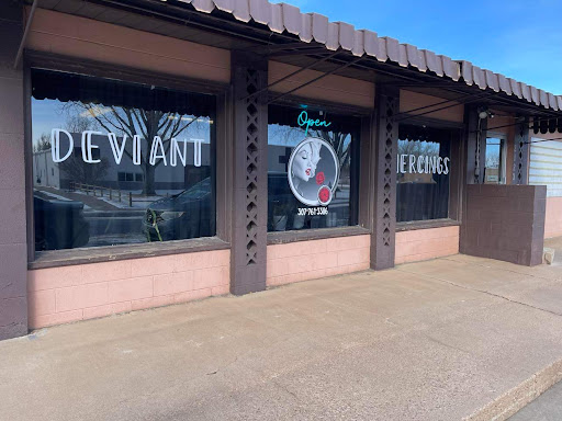 Explore black and white tattoo ideas for men, creative tattoo ideas in Laramie, available at Deviant Piercings and Tattoo