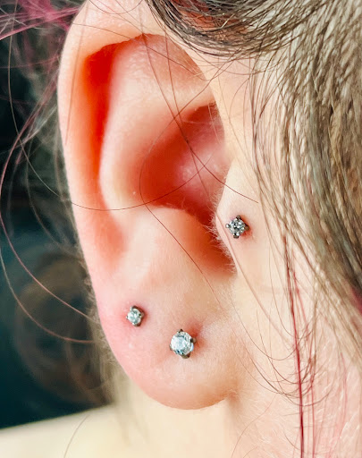 Explore hunting fishing tattoo ideas, creative tattoo ideas in San Diego, available at Sideshow Tattoo and Piercing