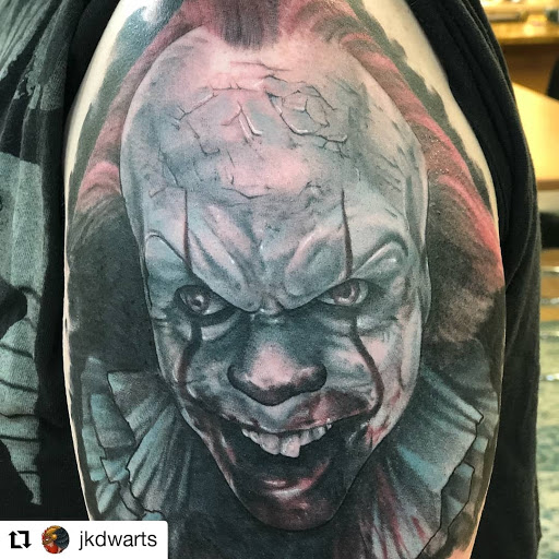 Explore fist bump tattoo ideas, creative tattoo ideas in Rochester, available at Sacred Heart Studios